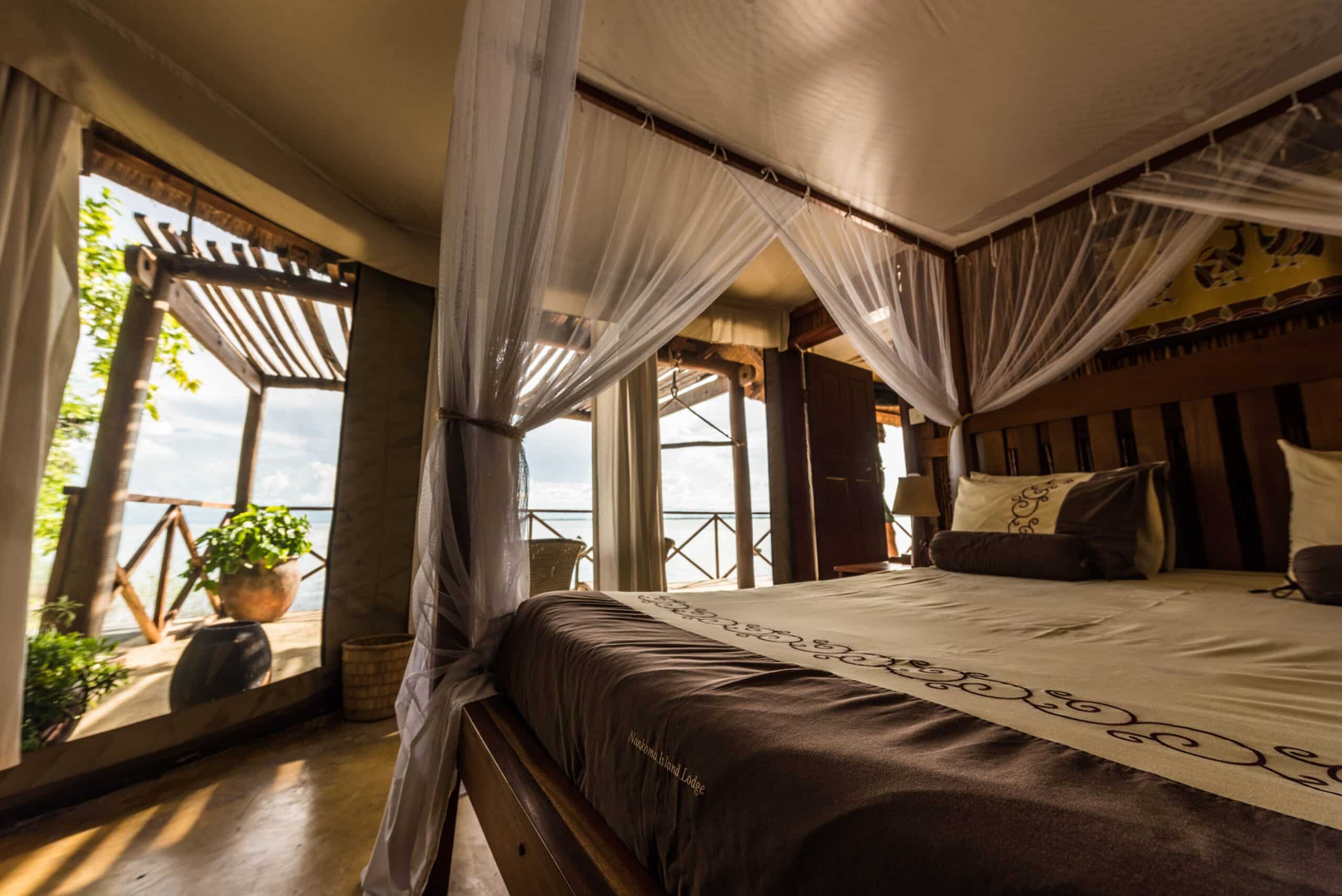alt="bedroom at blue zebra-explore malawi highlights-travel with la french"