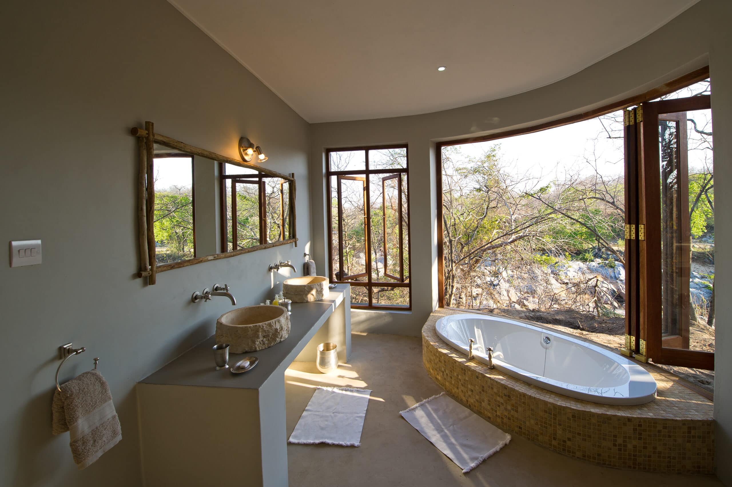 alt="Ensuite bathrooms at Mkulumadzi Lodge-explore malawi highlights-travel with la french"